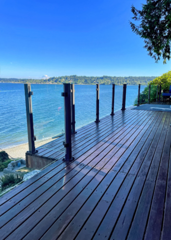 Glass railing system on a deck overlooking Puget Sound in Washington.